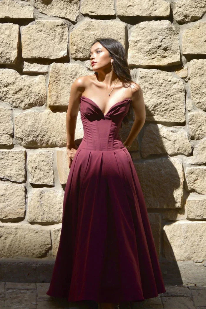 Abito midi bustier con corsetto taglio svasato da sera