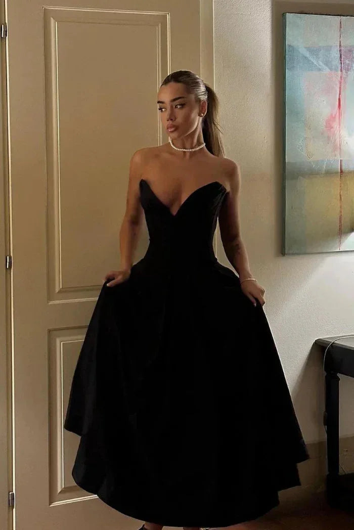 Abito midi bustier con corsetto taglio svasato da sera