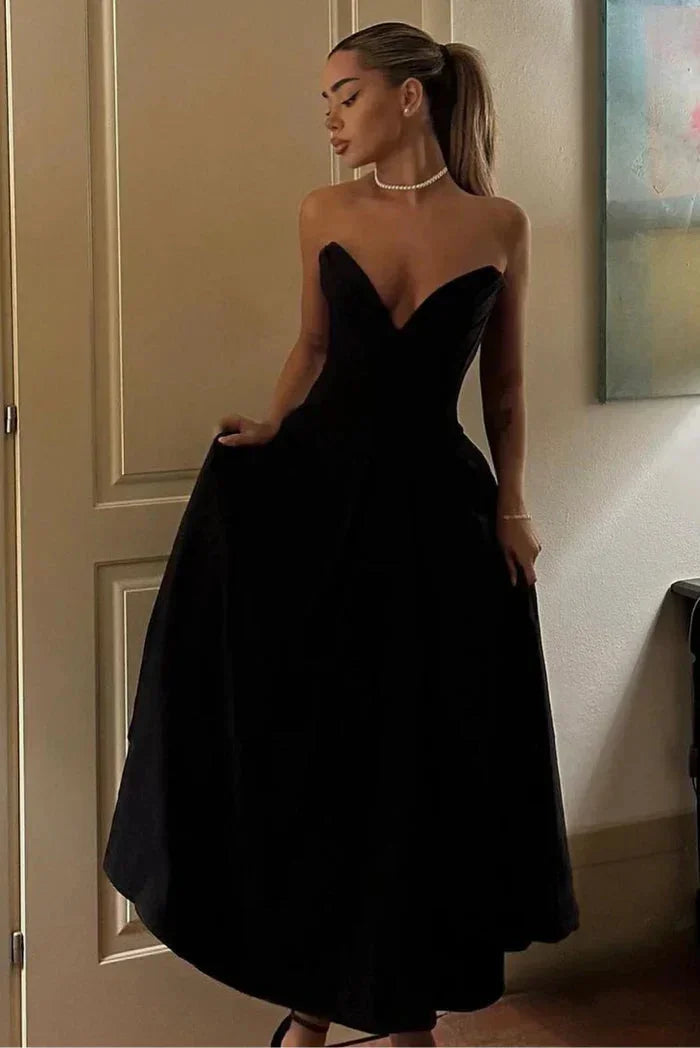 Abito midi bustier con corsetto taglio svasato da sera