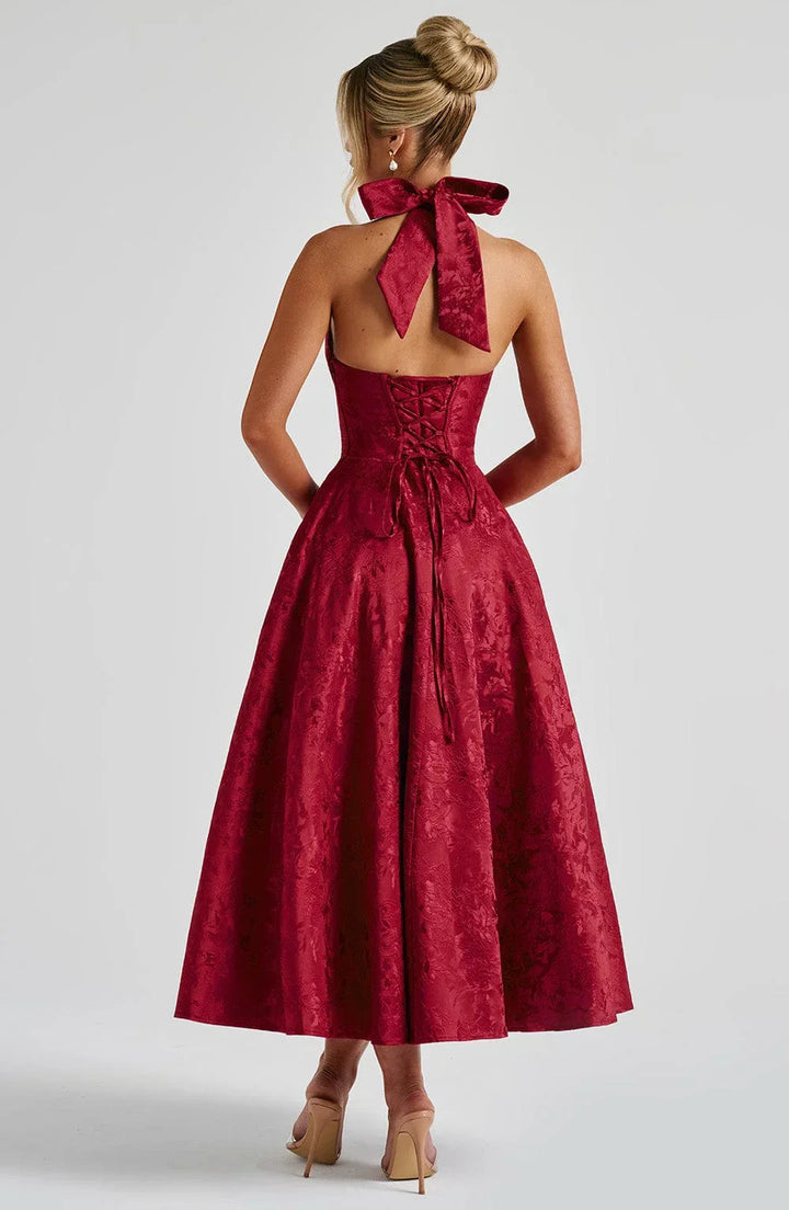 Vestito midi da donna con schiena scoperta e gonna svasata