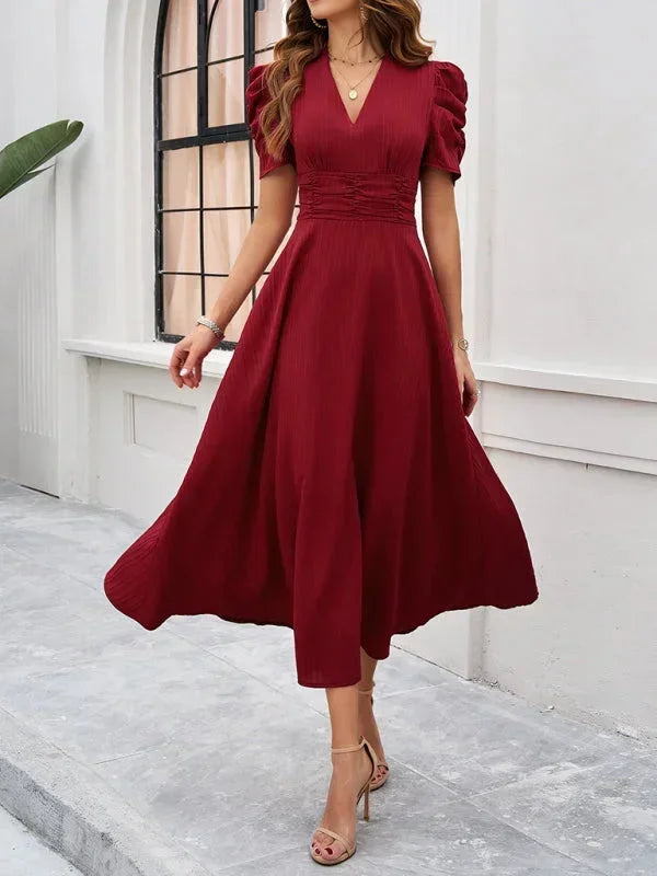 Abito midi donna scollo a V e maniche a sbuffo