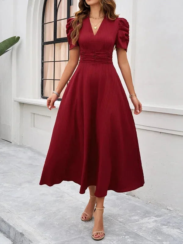 Abito midi donna scollo a V e maniche a sbuffo