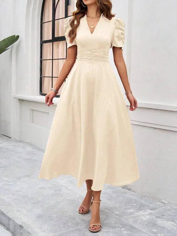 Abito midi donna scollo a V e maniche a sbuffo