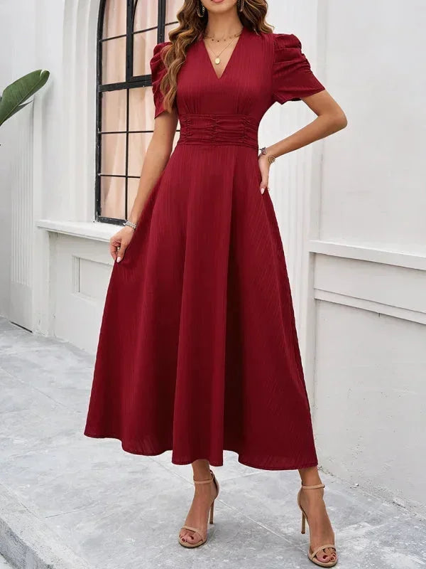 Abito midi donna scollo a V e maniche a sbuffo