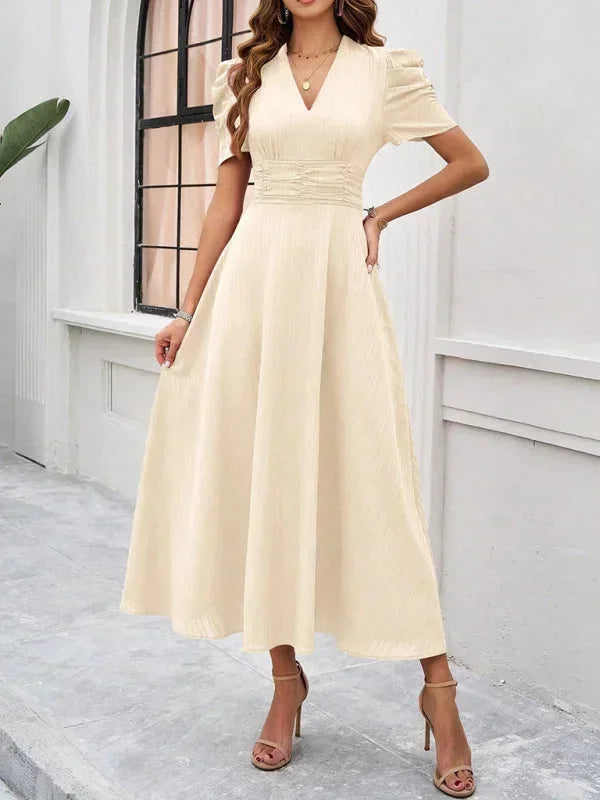 Abito midi donna scollo a V e maniche a sbuffo