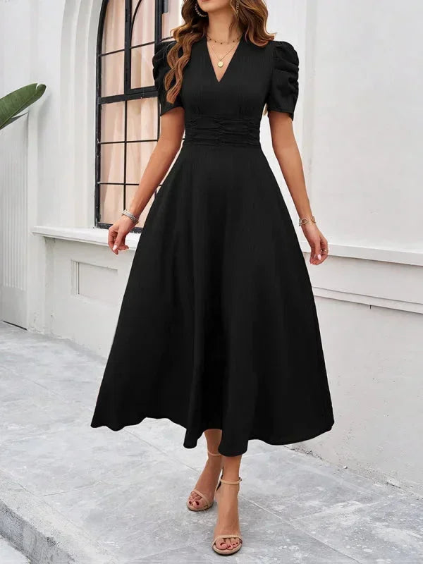 Abito midi donna scollo a V e maniche a sbuffo