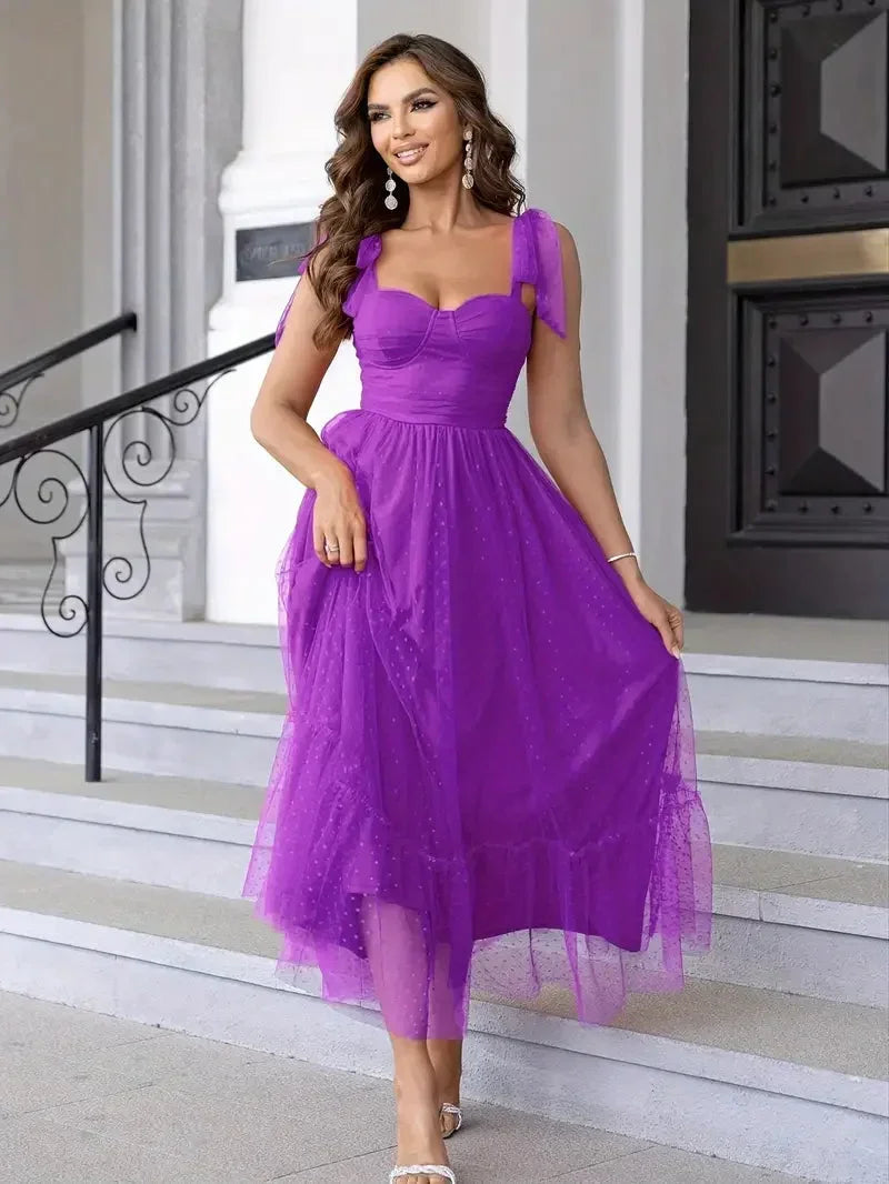 Abito midi donna in mesh a pois con fiocchi