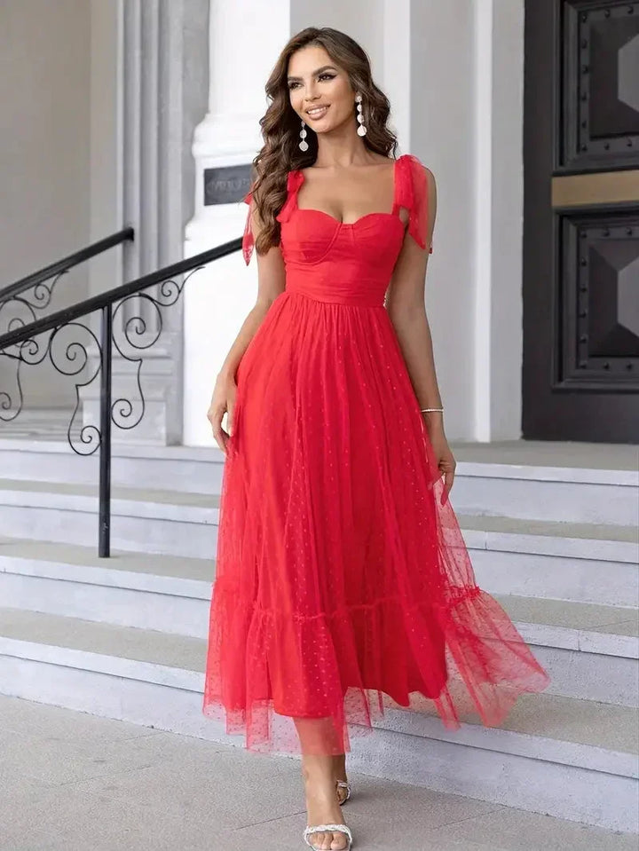 Abito midi donna in mesh a pois con fiocchi