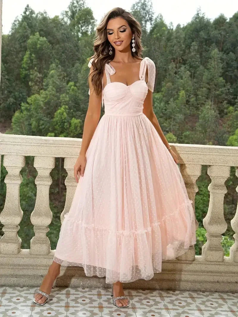 Abito midi donna in mesh a pois con fiocchi