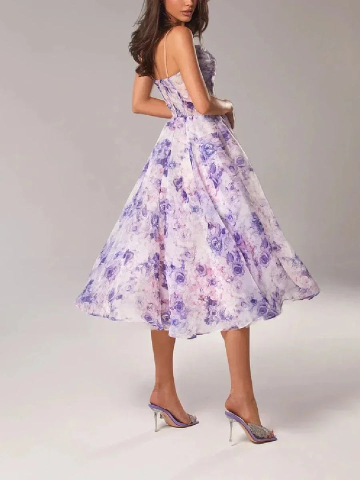 Abito midi donna fluido con stampa floreale e spalline sottili