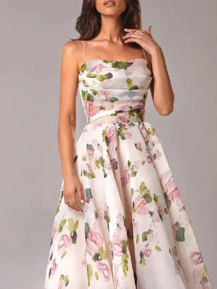 Abito midi donna fluido con stampa floreale e spalline sottili