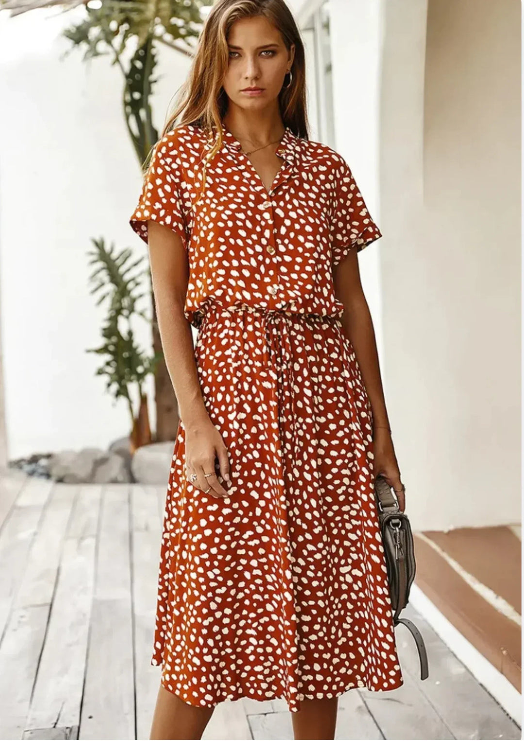 Abito midi donna a pois con laccetto in vita e maniche corte