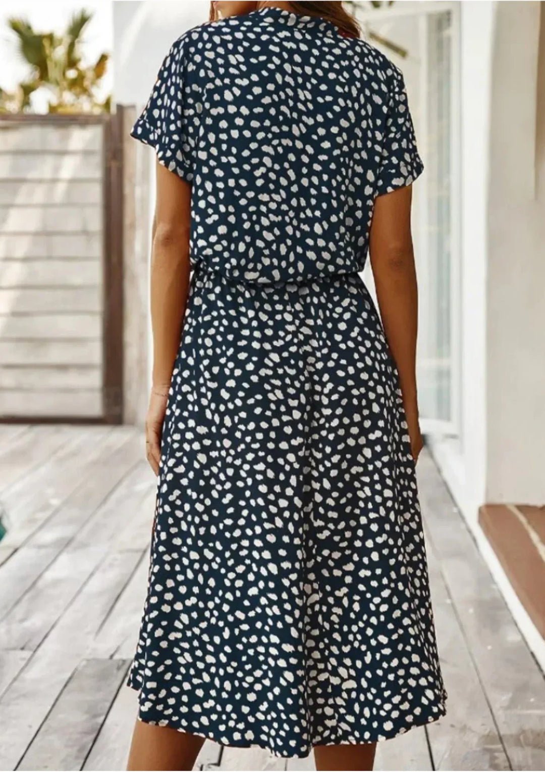 Abito midi donna a pois con laccetto in vita e maniche corte