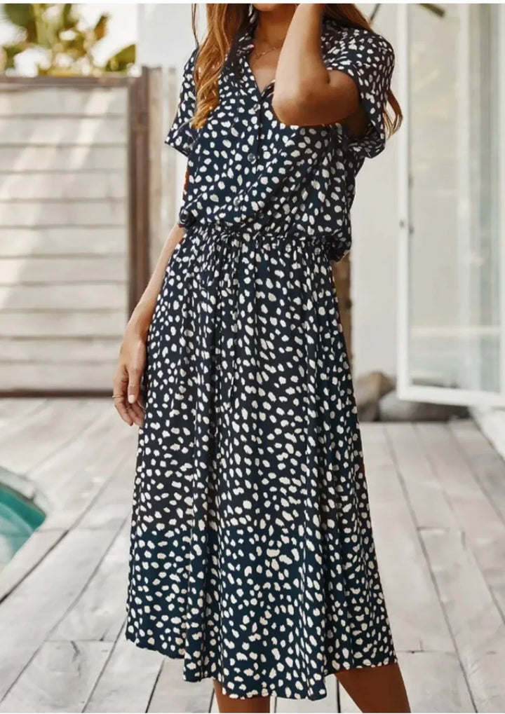 Abito midi donna a pois con laccetto in vita e maniche corte