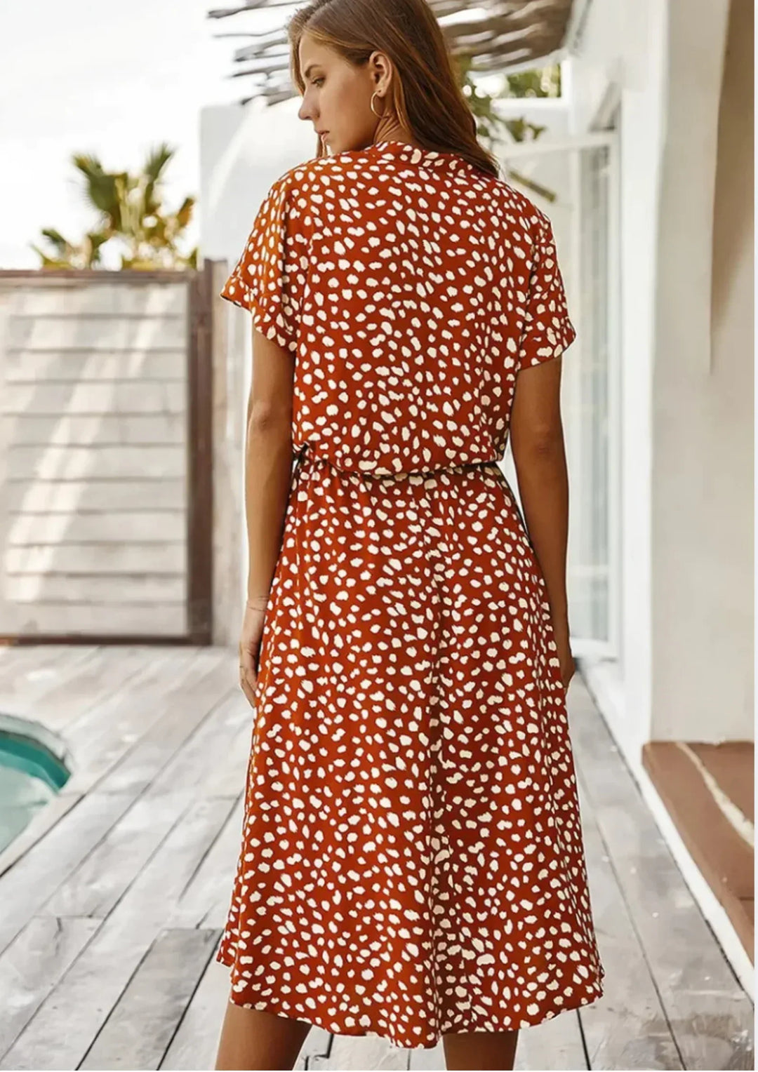 Abito midi donna a pois con laccetto in vita e maniche corte