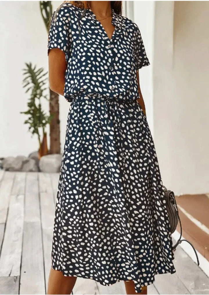 Abito midi donna a pois con laccetto in vita e maniche corte