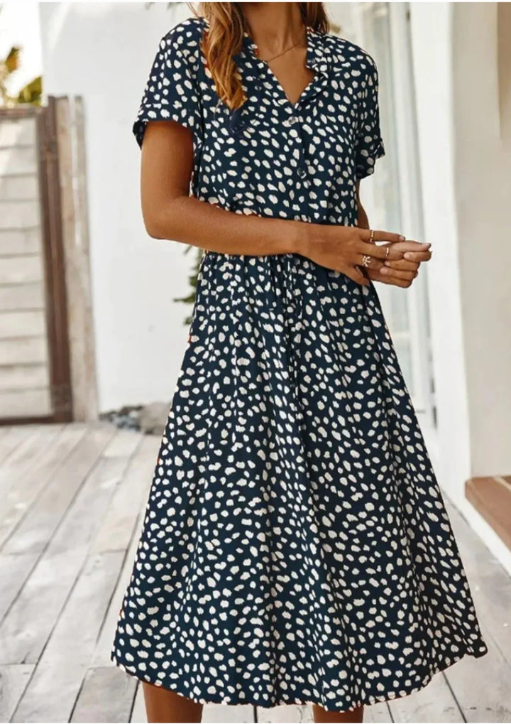 Abito midi donna a pois con laccetto in vita e maniche corte
