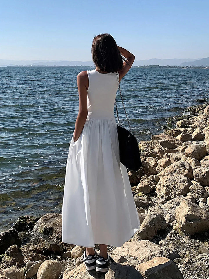 Abito midi donna senza maniche con gonna arricciata