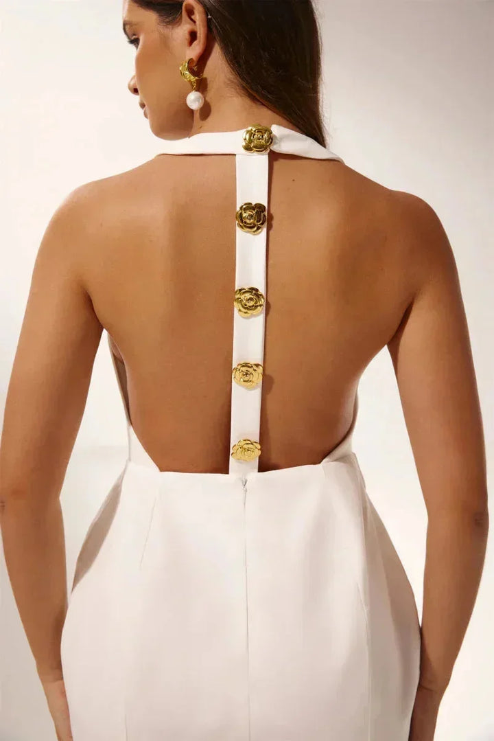 Vestito corto da sera con bottoni decorativi collo halter