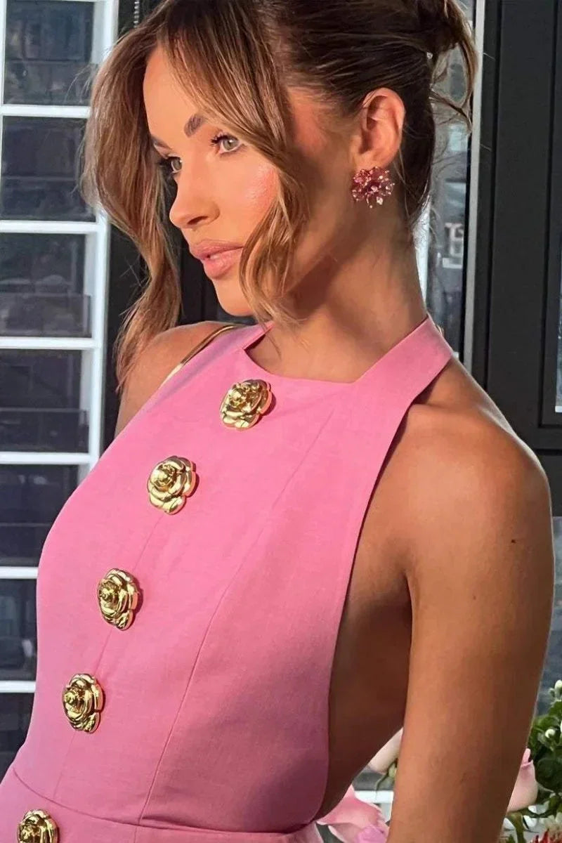 Vestito corto da sera con bottoni decorativi collo halter