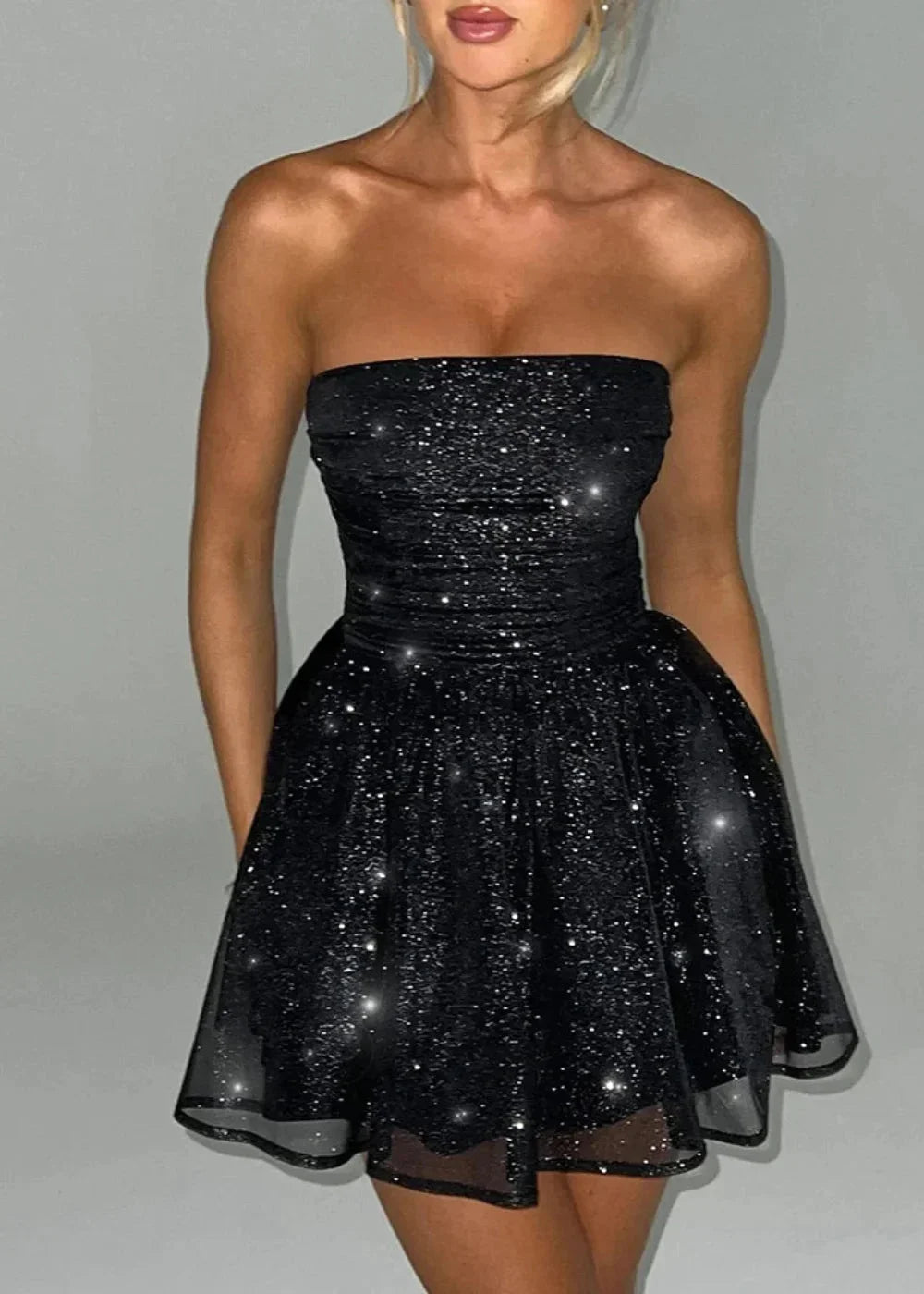 Vestito corto bustier con fiocco ed effetto paillettato