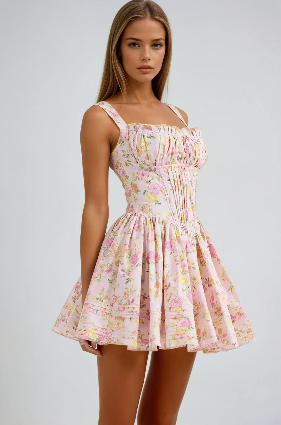 Vestito corto rosa a fiori con corsetto e spalline larghe