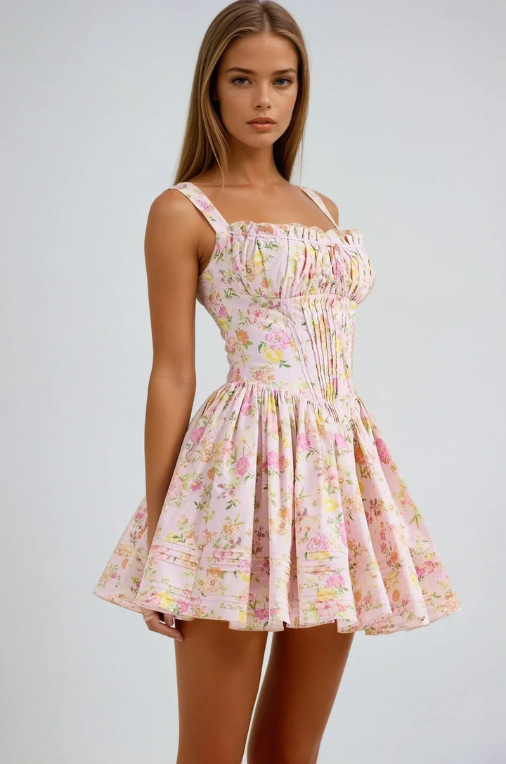 Vestito corto rosa a fiori con corsetto e spalline larghe