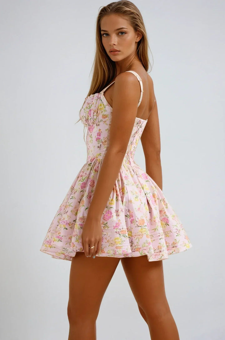 Vestito corto rosa a fiori con corsetto e spalline larghe