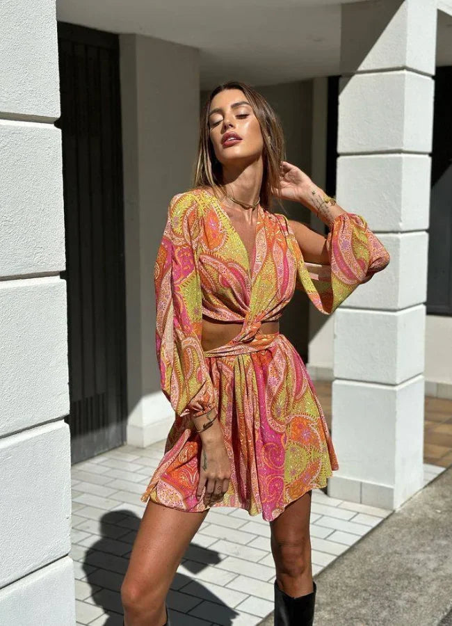 Vestito corto estivo stampato rosa e giallo con maniche lunghe