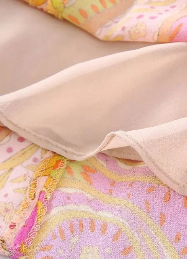 Vestito corto estivo stampato rosa e giallo con maniche lunghe