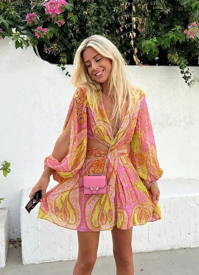 Vestito corto estivo stampato rosa e giallo con maniche lunghe