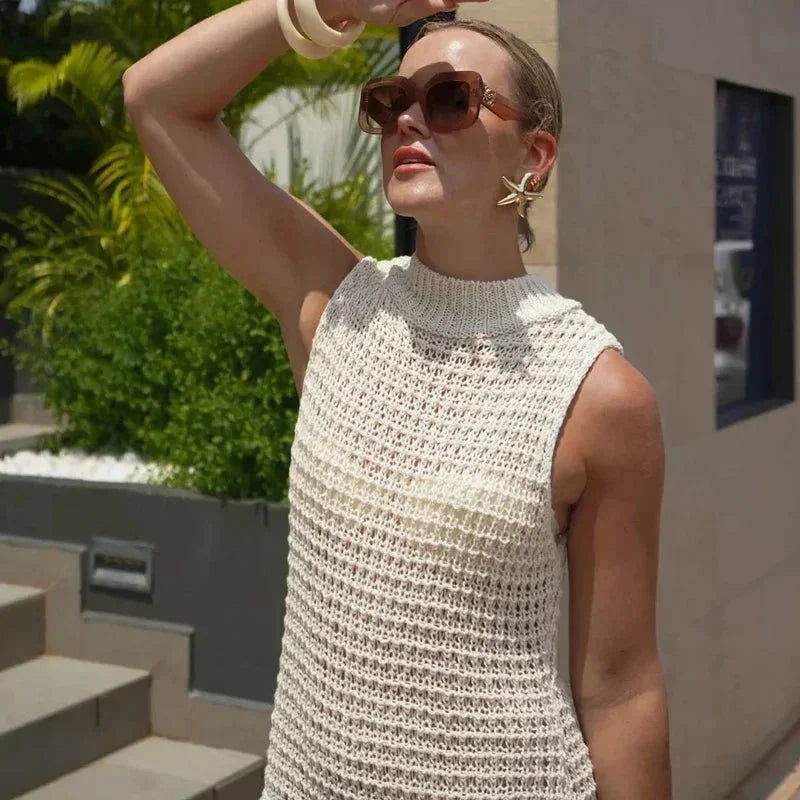 Vestito corto da donna in maglia color avorio senza Maniche con frange