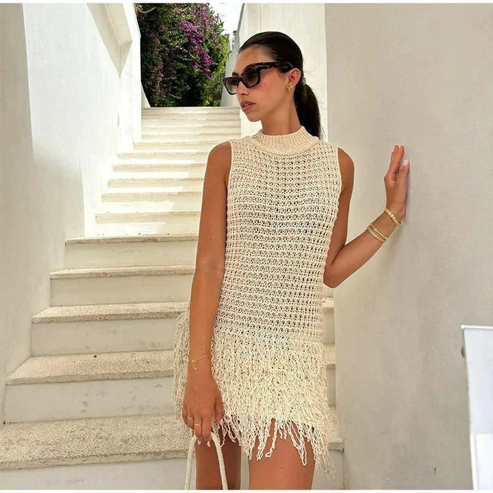 Vestito corto da donna in maglia color avorio senza Maniche con frange