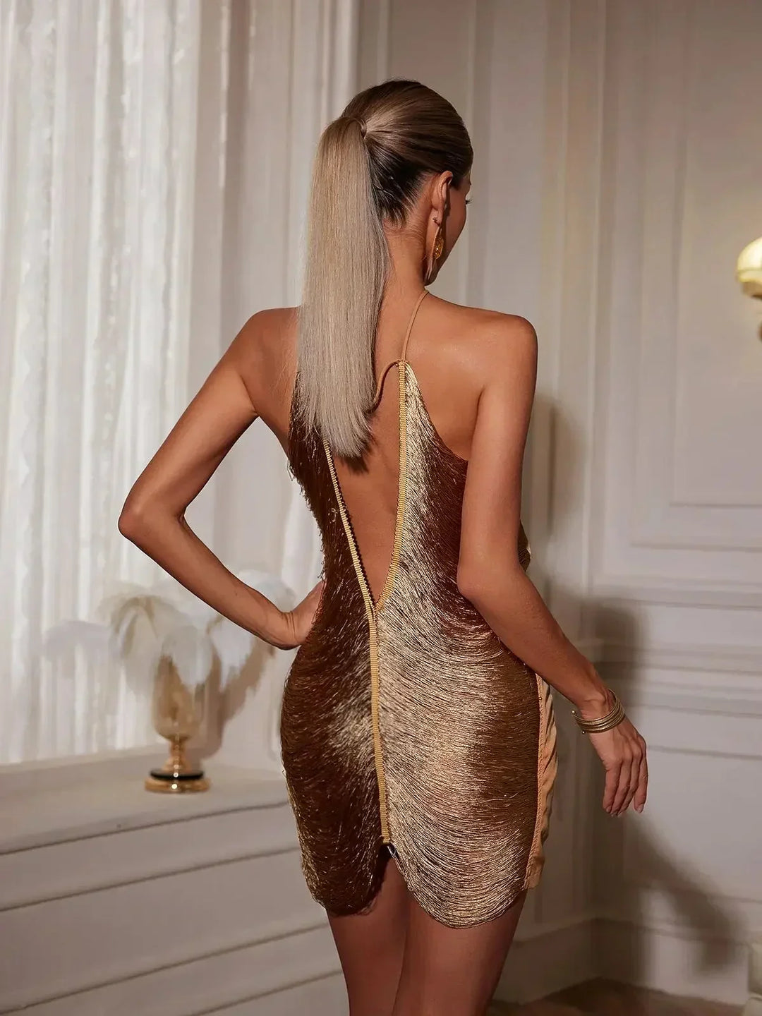 Vestito corto donna metallizzato asimmetrico schiena nuda da sera