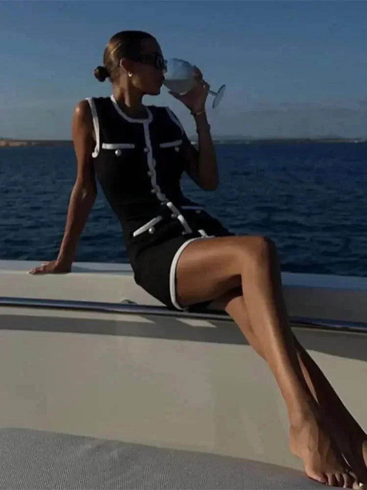 Vestito corto donna nero dettagli di perle bordo bianco