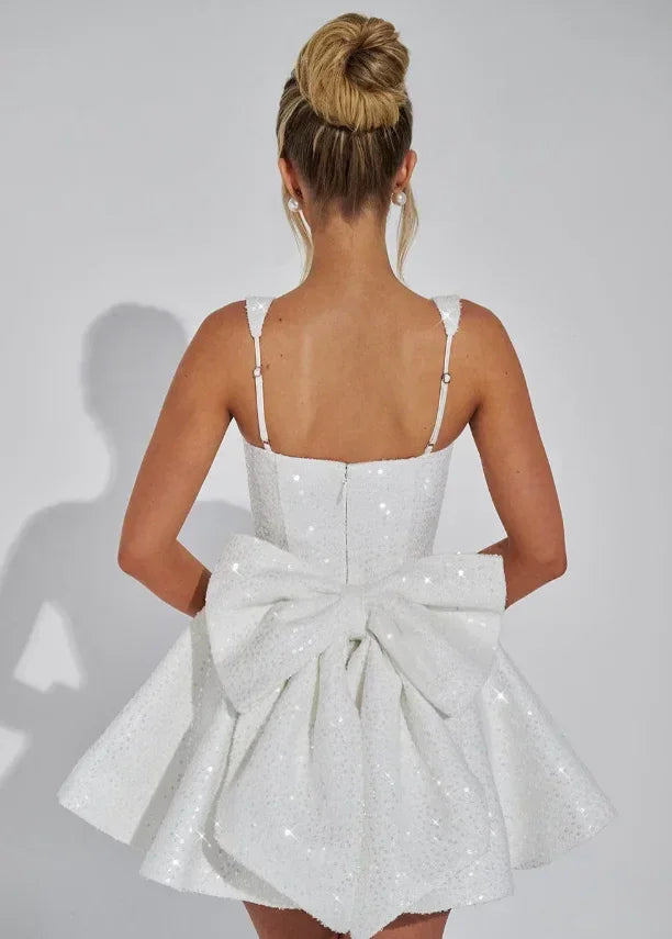 Vestito corto da donna con paillettes, bretelle e fiocco