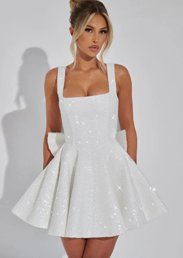 Vestito corto da donna con paillettes, bretelle e fiocco