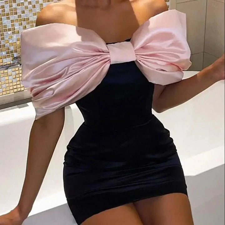 Vestito corto con Spalle scoperte con grande fiocco decorativo