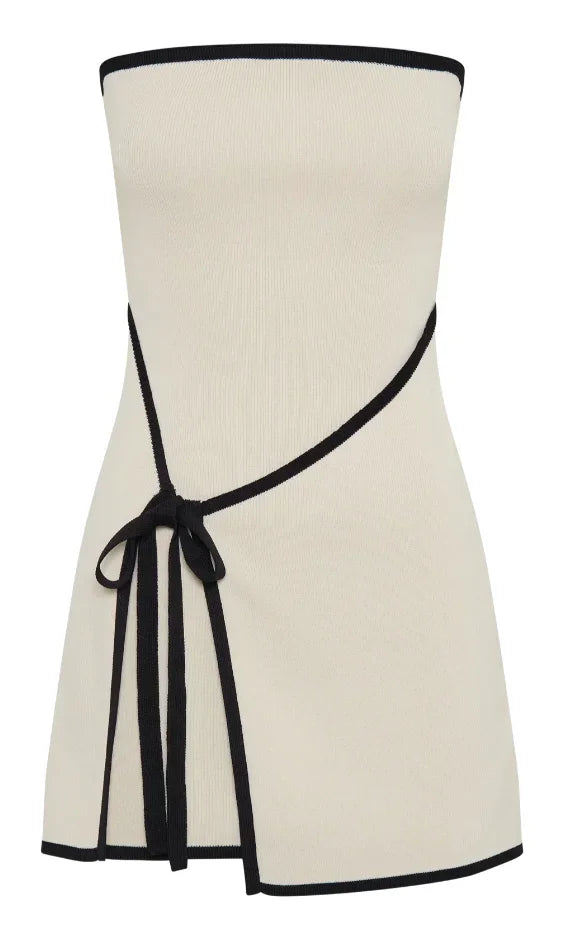 Vestito corto beige senza maniche bordi neri con fiocco