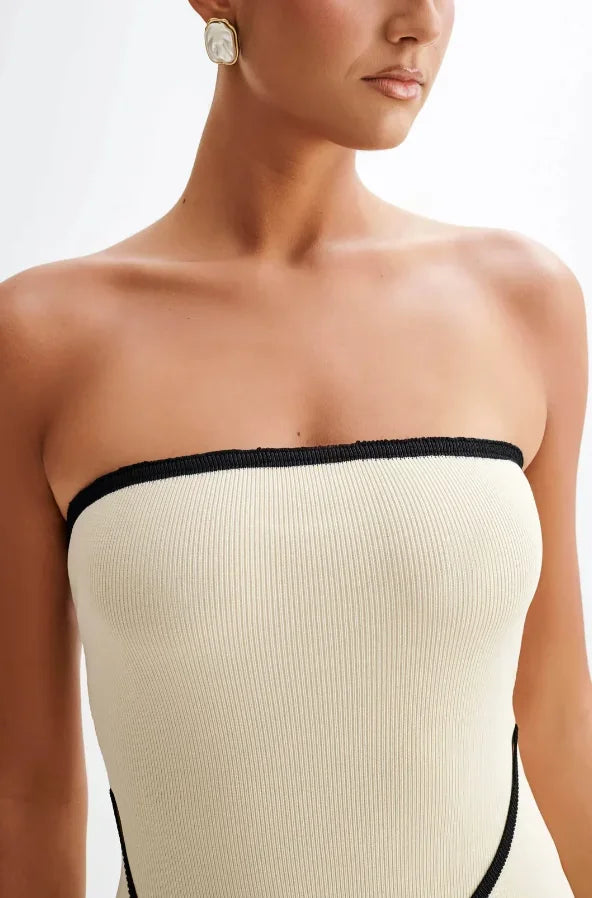 Vestito corto beige senza maniche bordi neri con fiocco