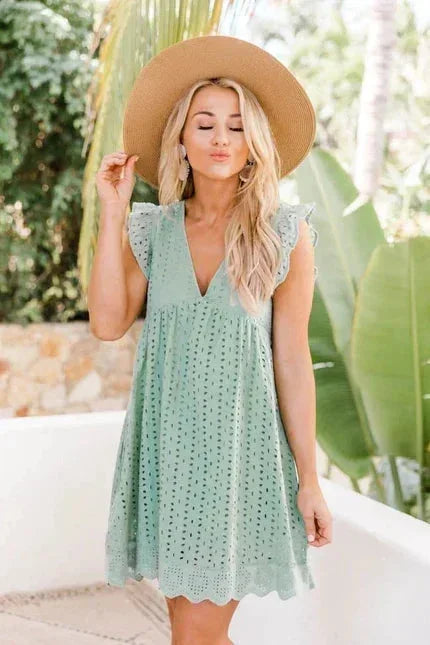 Vestito corto da donna senza maniche in pizzo con tasche