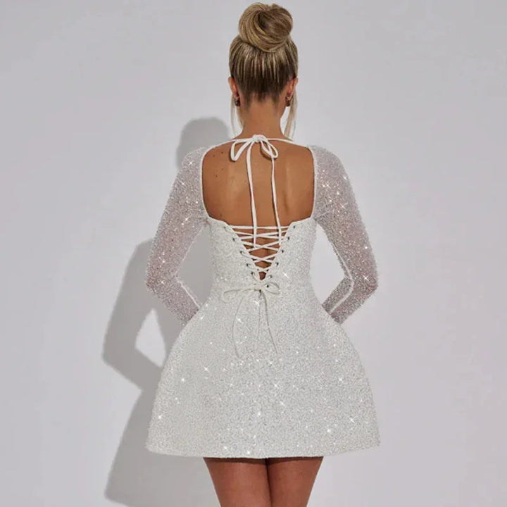 Vestito corto da donna da sera scintillante con maniche lunghe