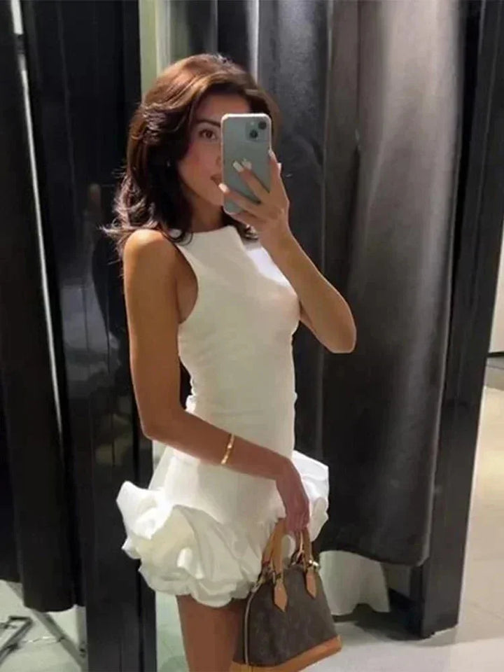 Vestito corto donna senza maniche con orlo a volant