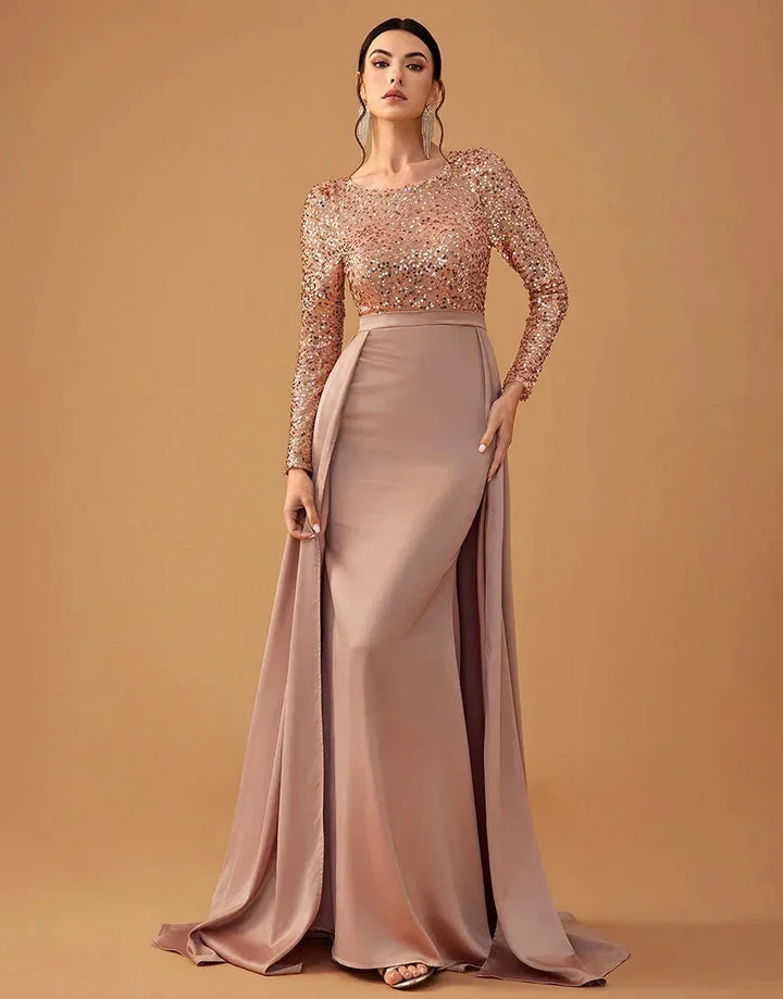 Vestito da sera lungo con paillettes e gonna fluida