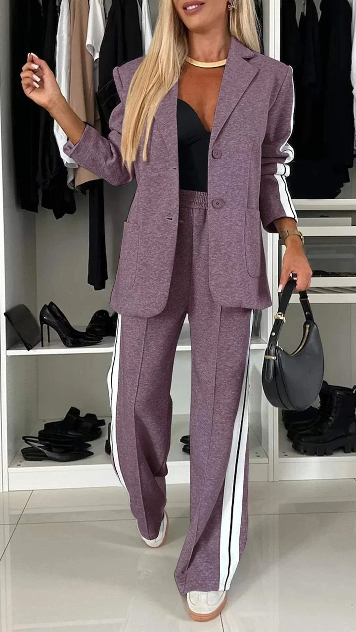 Completo blazer e pantaloni da donna con righe e tasche